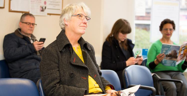 Woman sitting in waiting room